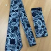 Blauwzwarte stropdas met patroon