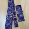 Paarse stropdas met patroon