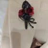Zwart bordeaux corsage bruidegom