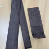 Zwarte stropdas met patroon